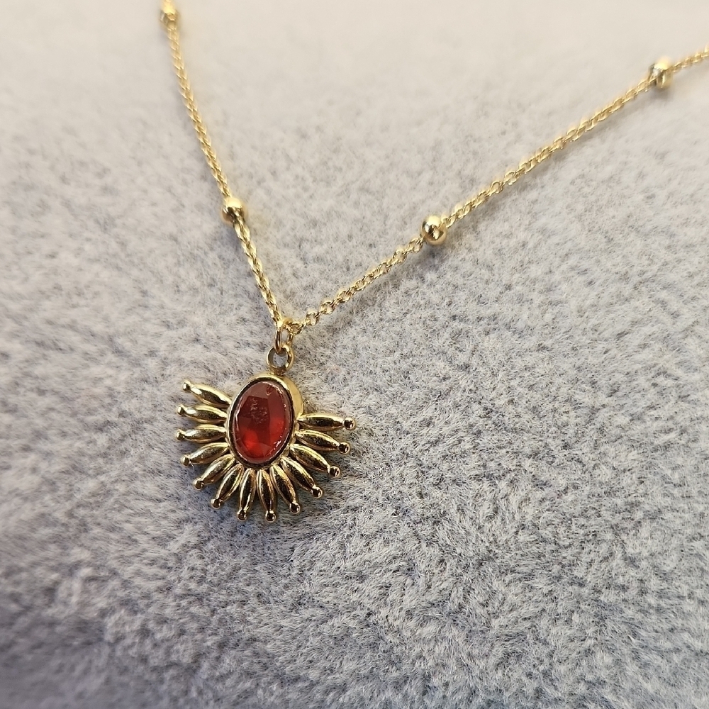18k Gold Plated Stainless Steel Radiant Necklace with Red Sunburst Pendant